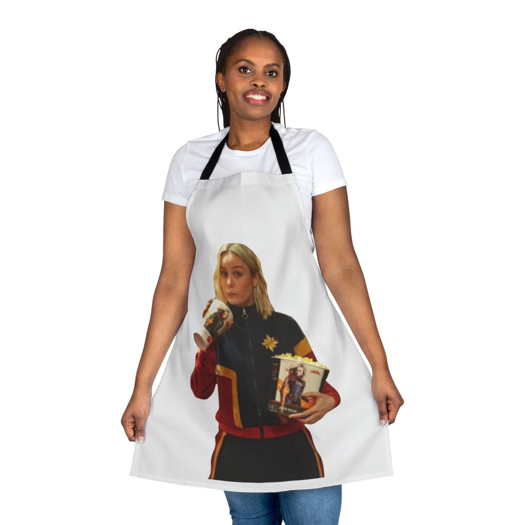 A vibrant apron featuring the iconic Captain Marvel logo and colors, designed to empower women in the kitchen and beyond.