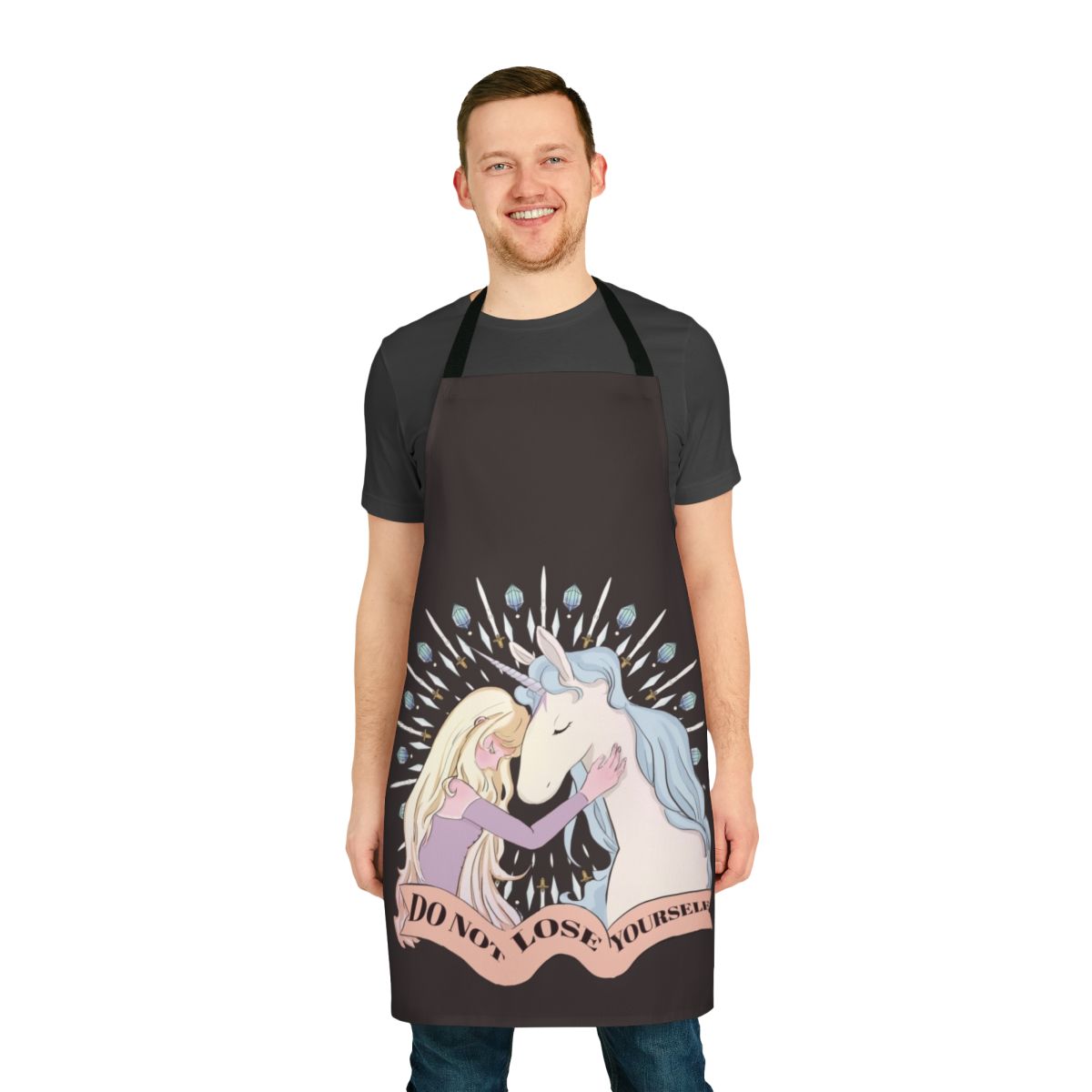 An apron featuring the character Lady Amalthea from the classic fantasy film The Last Unicorn.