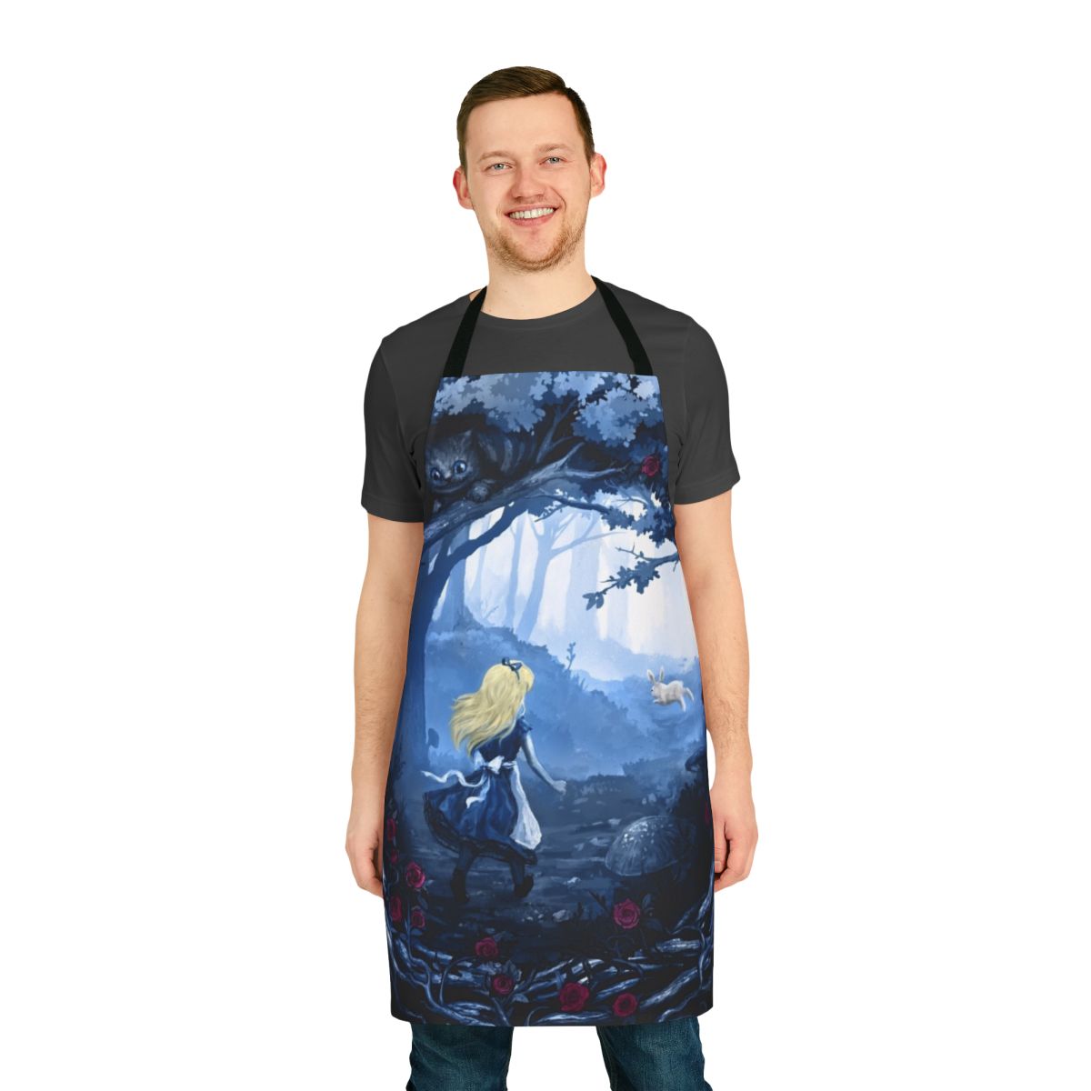 Whimsical apron featuring an Alice in Wonderland inspired design with rabbits, flowers, and enchanted forest elements.