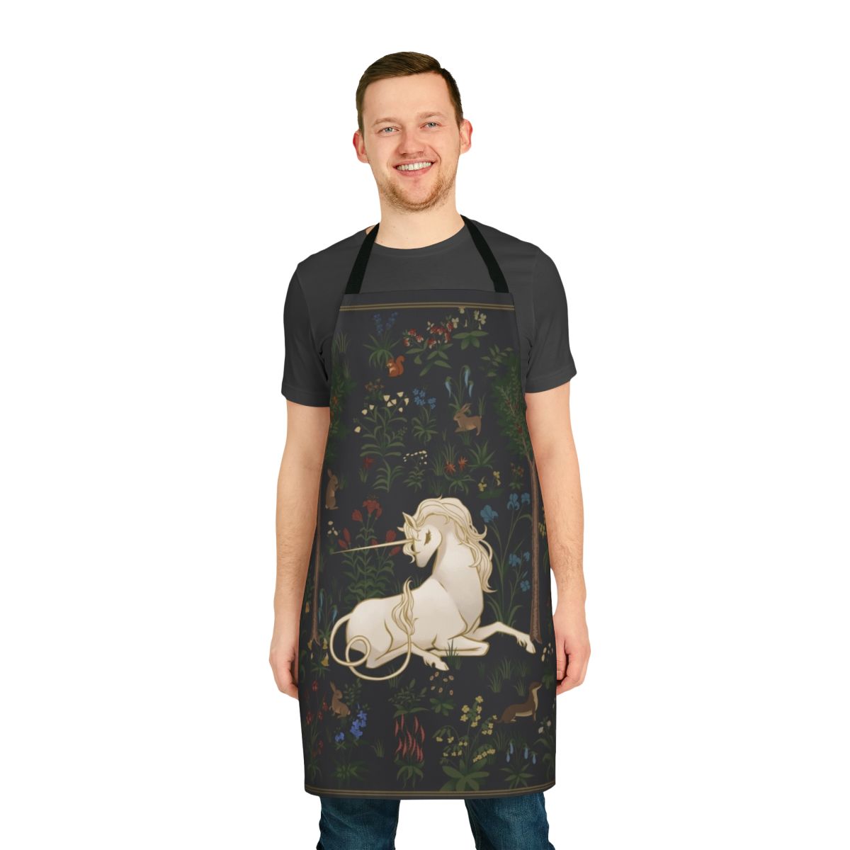 Whimsical apron featuring a magical unicorn in a lush forest setting