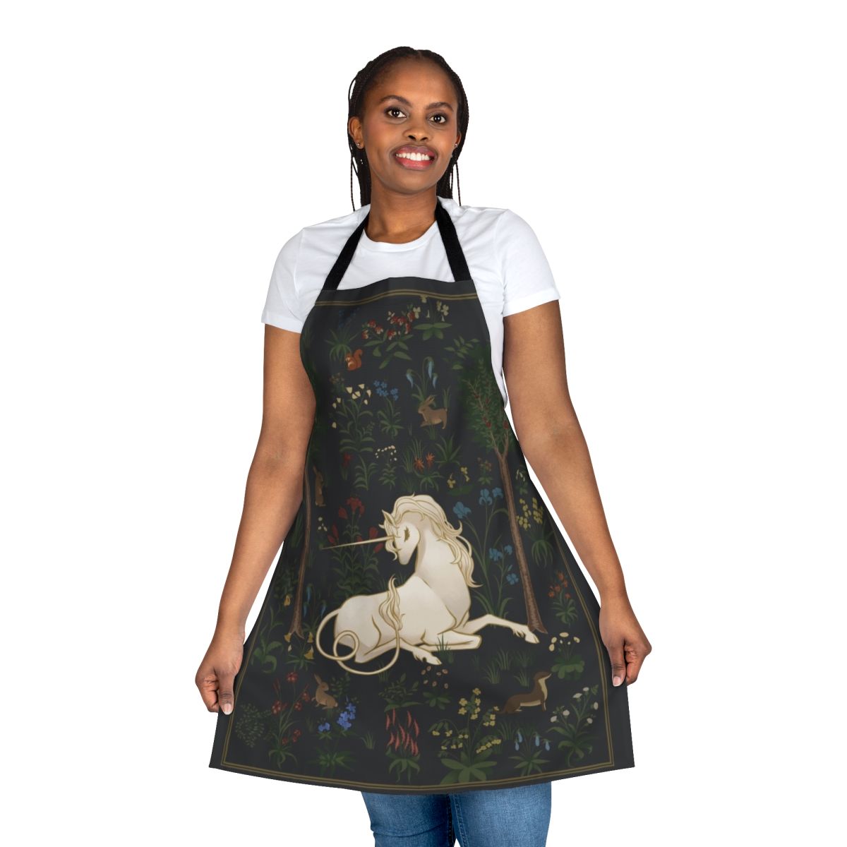 Whimsical apron featuring a magical unicorn in a lush forest setting