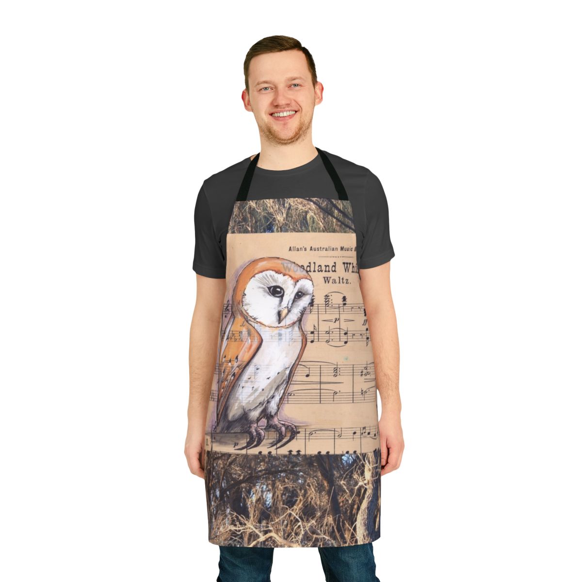 Whimsical apron featuring a barn owl perched among musical notes and nature elements