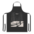 A stylish and dark-themed apron featuring a forest design, inspired by the music of the iconic new wave band The Cure.