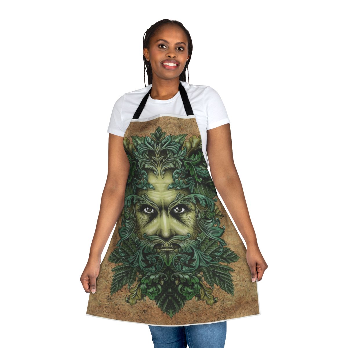 Image of a decorative apron featuring a stylized greenman illustration with intricate leaf and scroll designs.