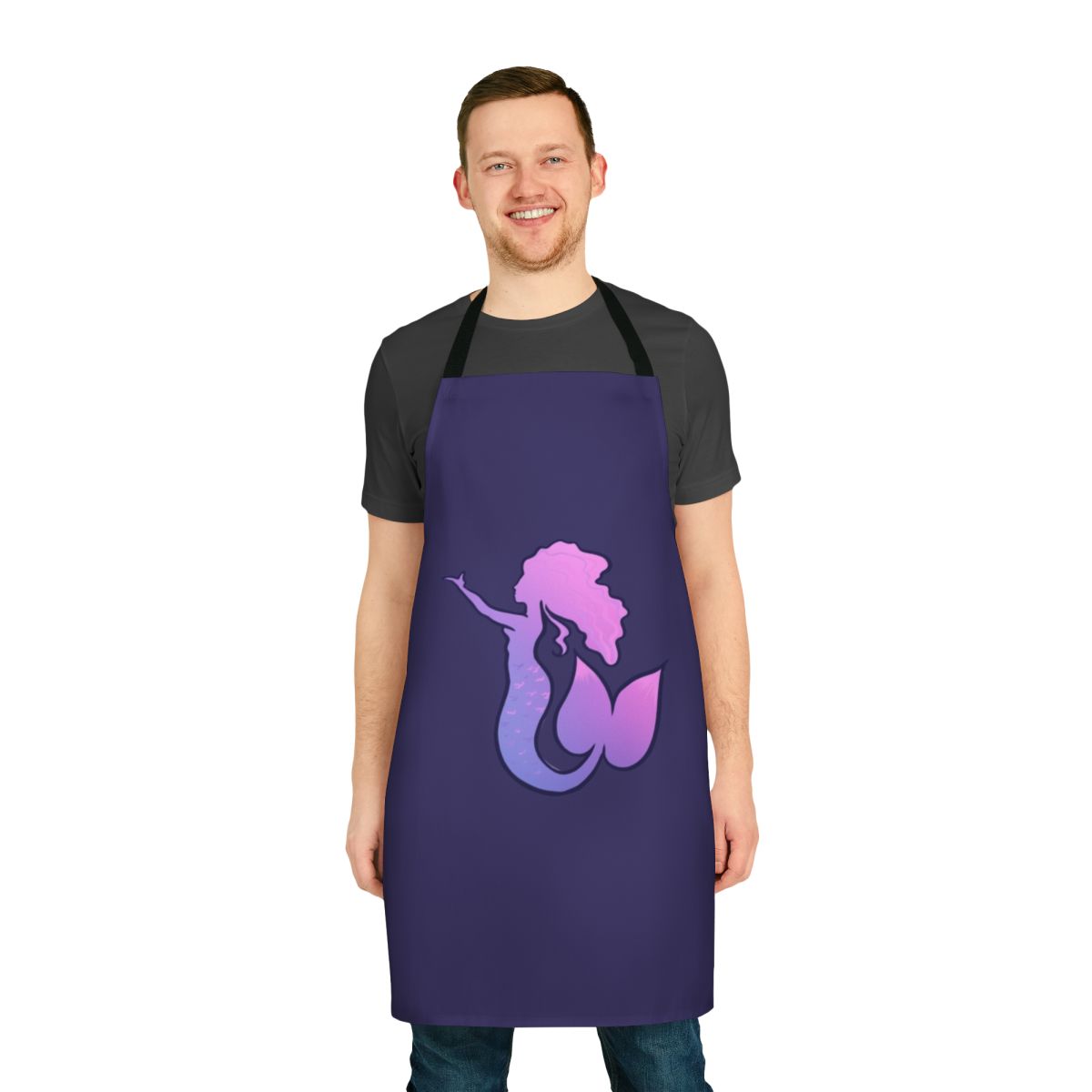 A pink and purple mermaid-themed apron with a whimsical design, perfect for the kitchen.
