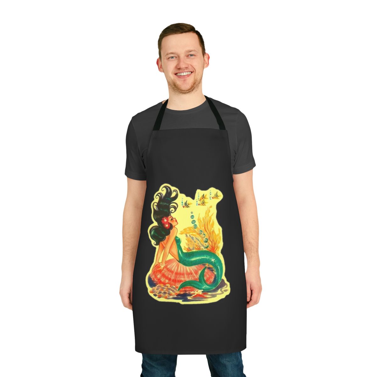 A black apron with a whimsical mermaid design, perfect for the mermaid lover in your life.