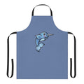 Whimsical illustration of a happy narwhal on a navy blue kitchen apron