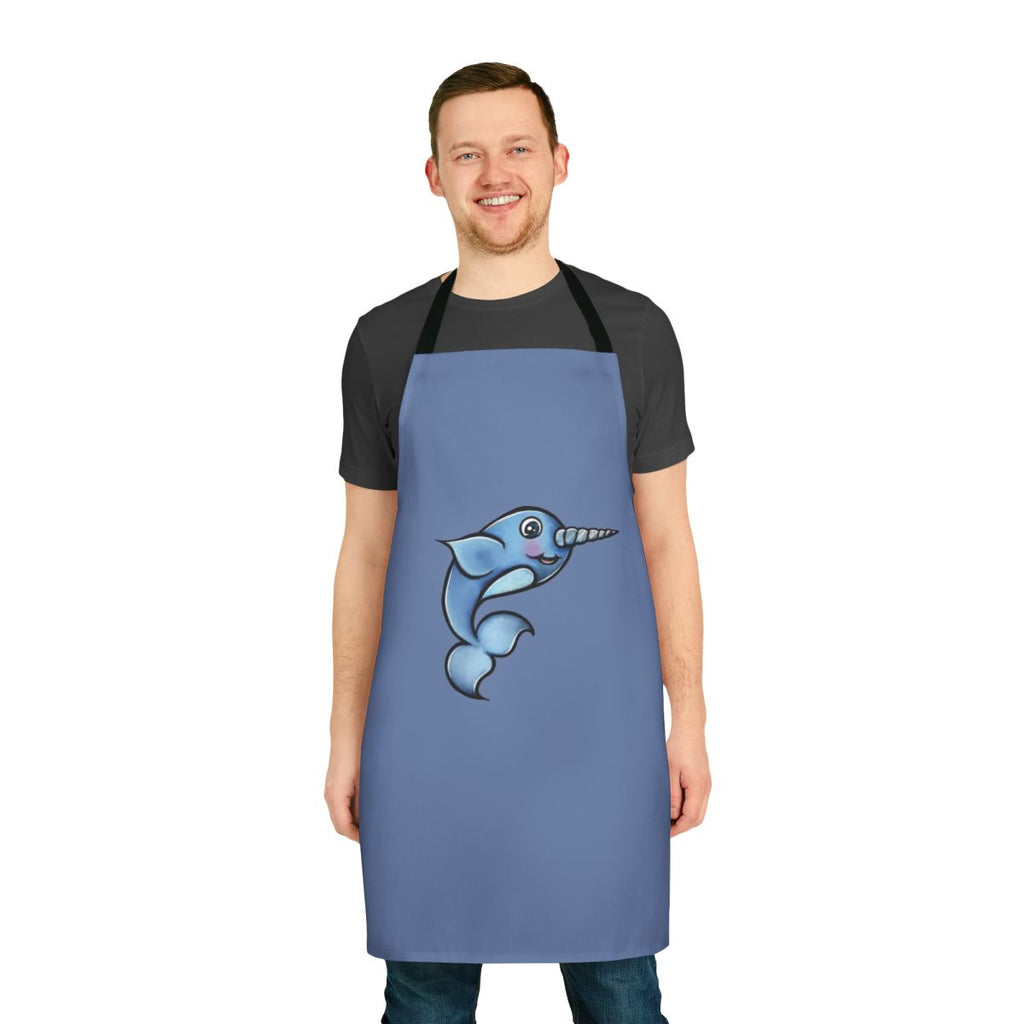 Whimsical illustration of a happy narwhal on a navy blue kitchen apron