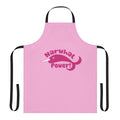 A vibrant apron featuring a playful narwhal design, perfect for the kitchen.