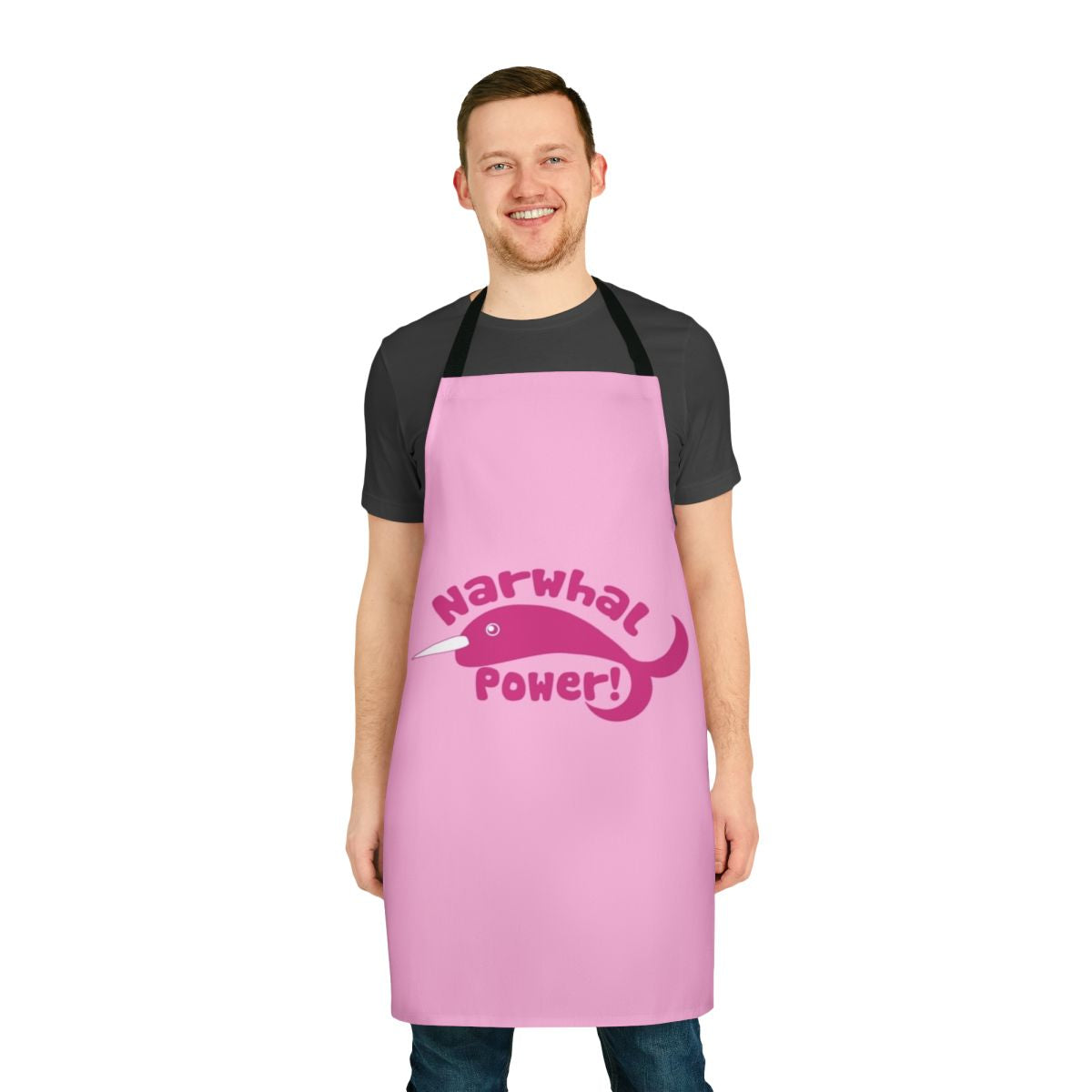 A vibrant apron featuring a playful narwhal design, perfect for the kitchen.