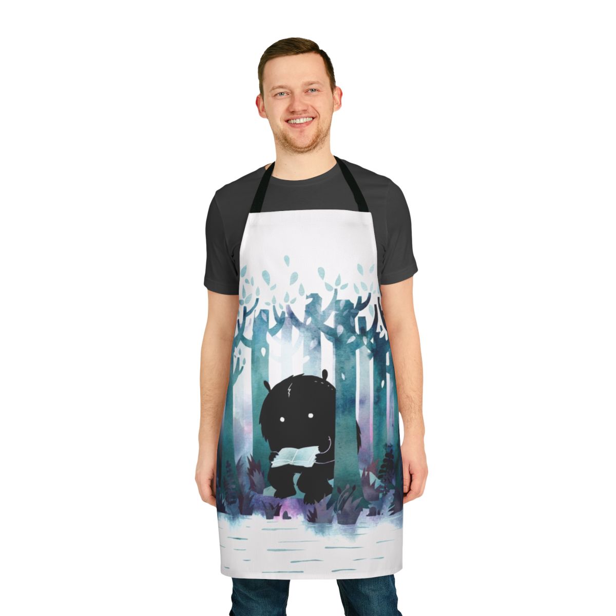 Whimsical apron featuring a watercolor forest scene and literary elements