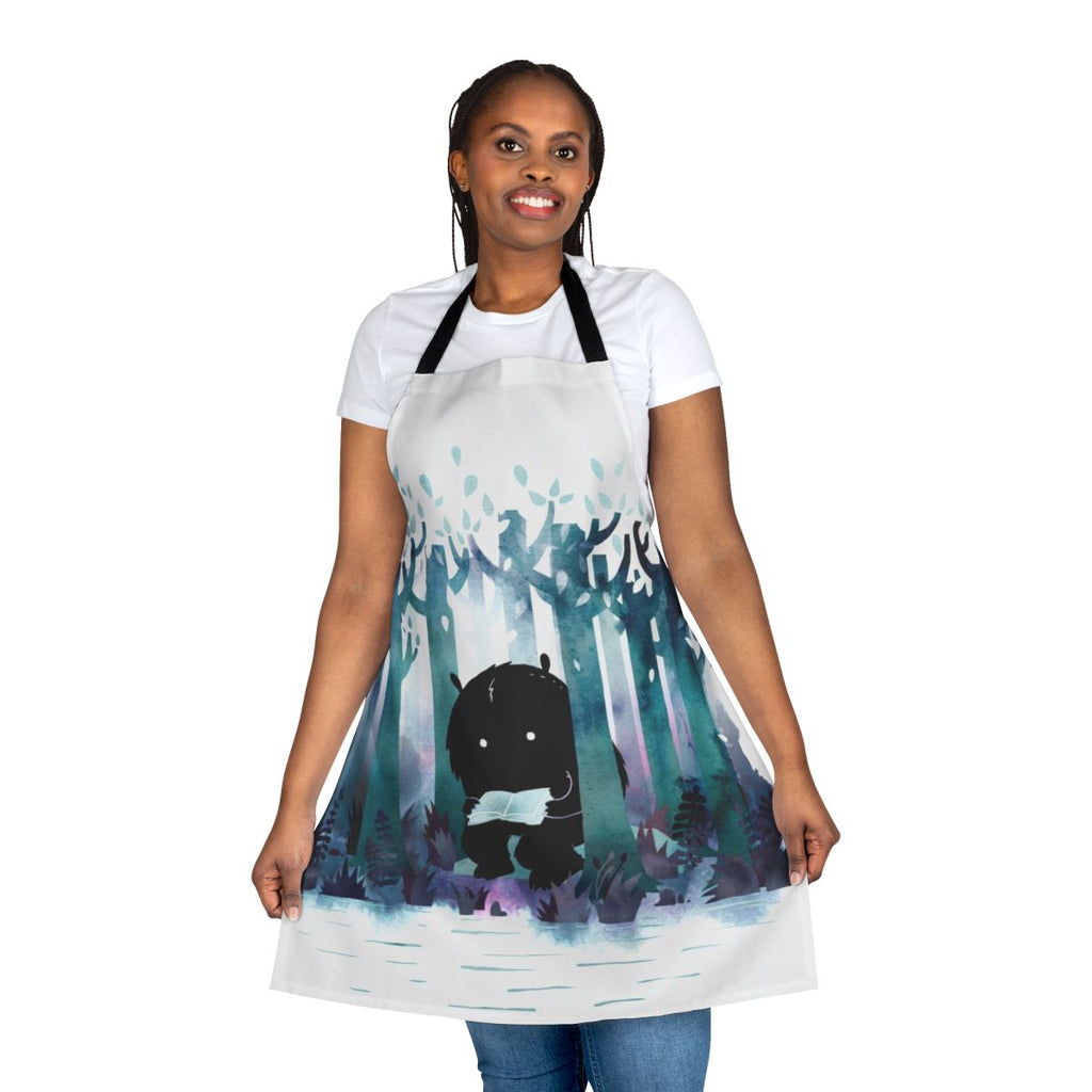 Whimsical apron featuring a watercolor forest scene and literary elements