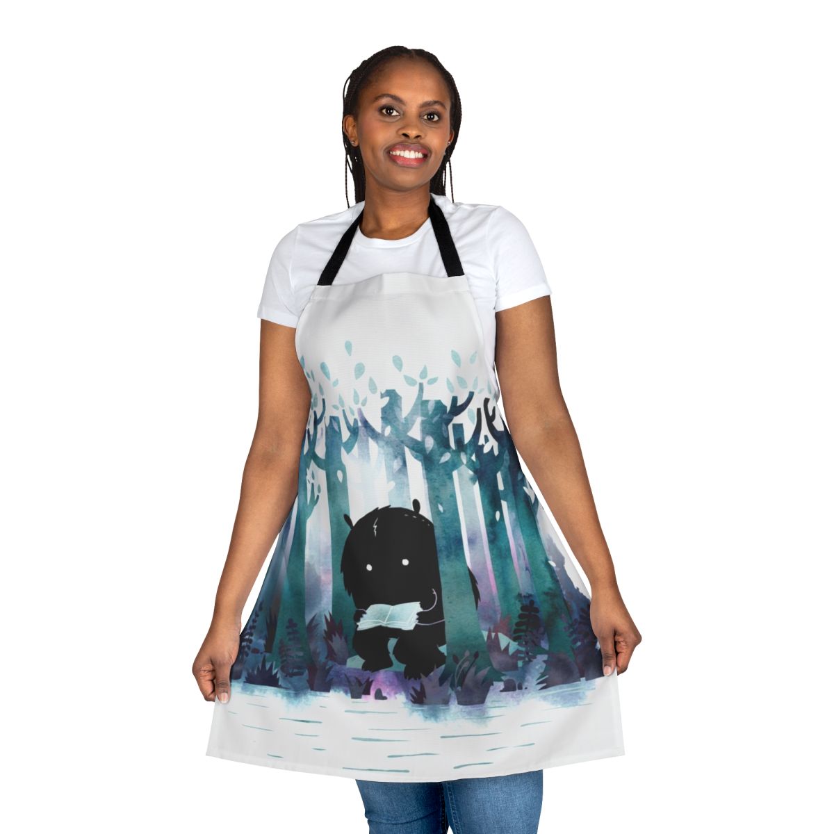 Whimsical apron featuring a watercolor forest scene and literary elements