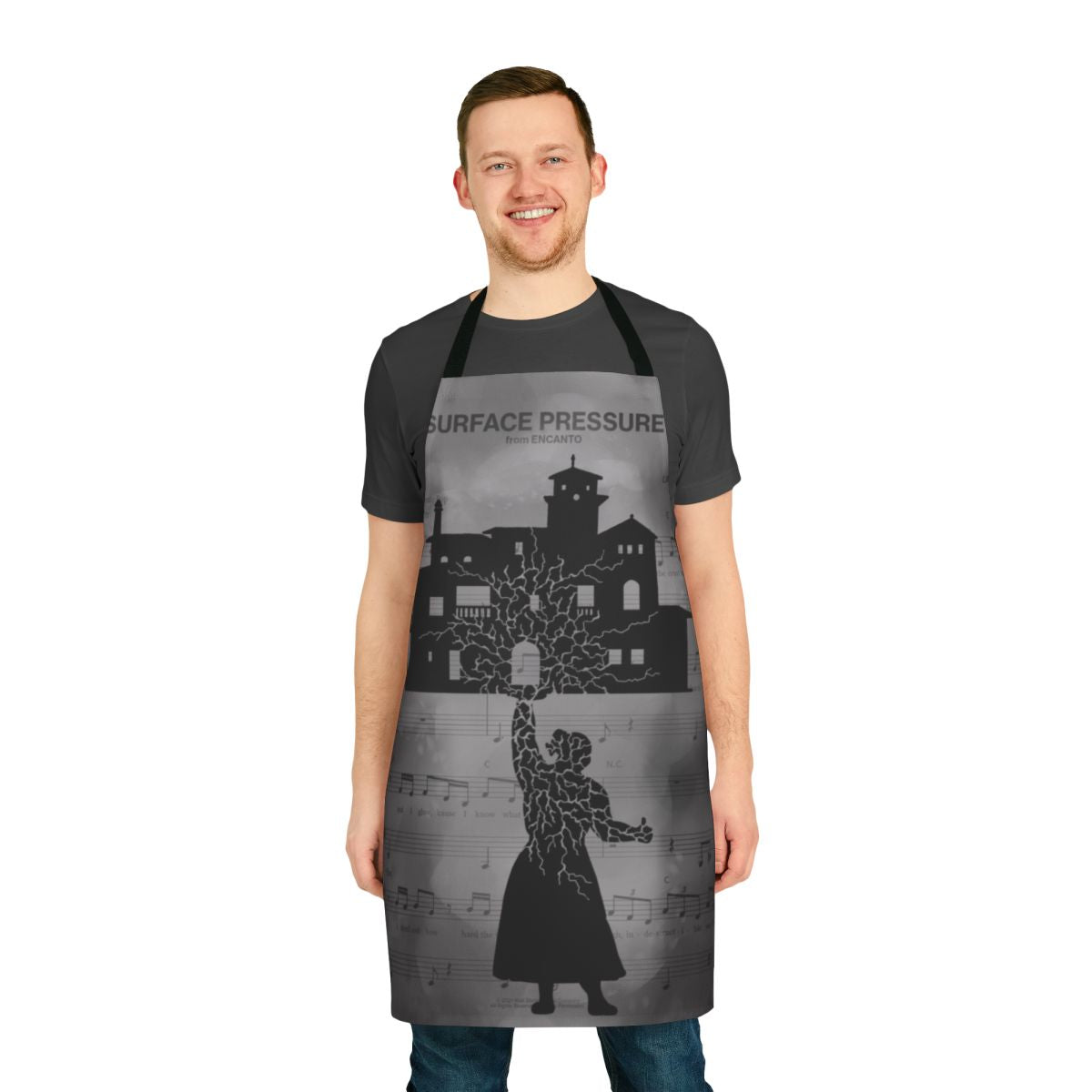 Pressure-themed cooking apron featuring sheet music designs inspired by the Disney movie Encanto