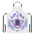 Vibrant watercolor illustration of a scarab beetle on an apron with mystical symbols and patterns.