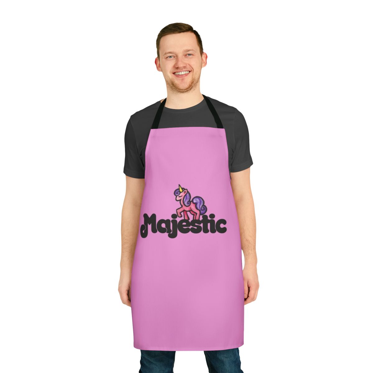 A pink and white apron with a magical unicorn design, perfect for the kitchen.