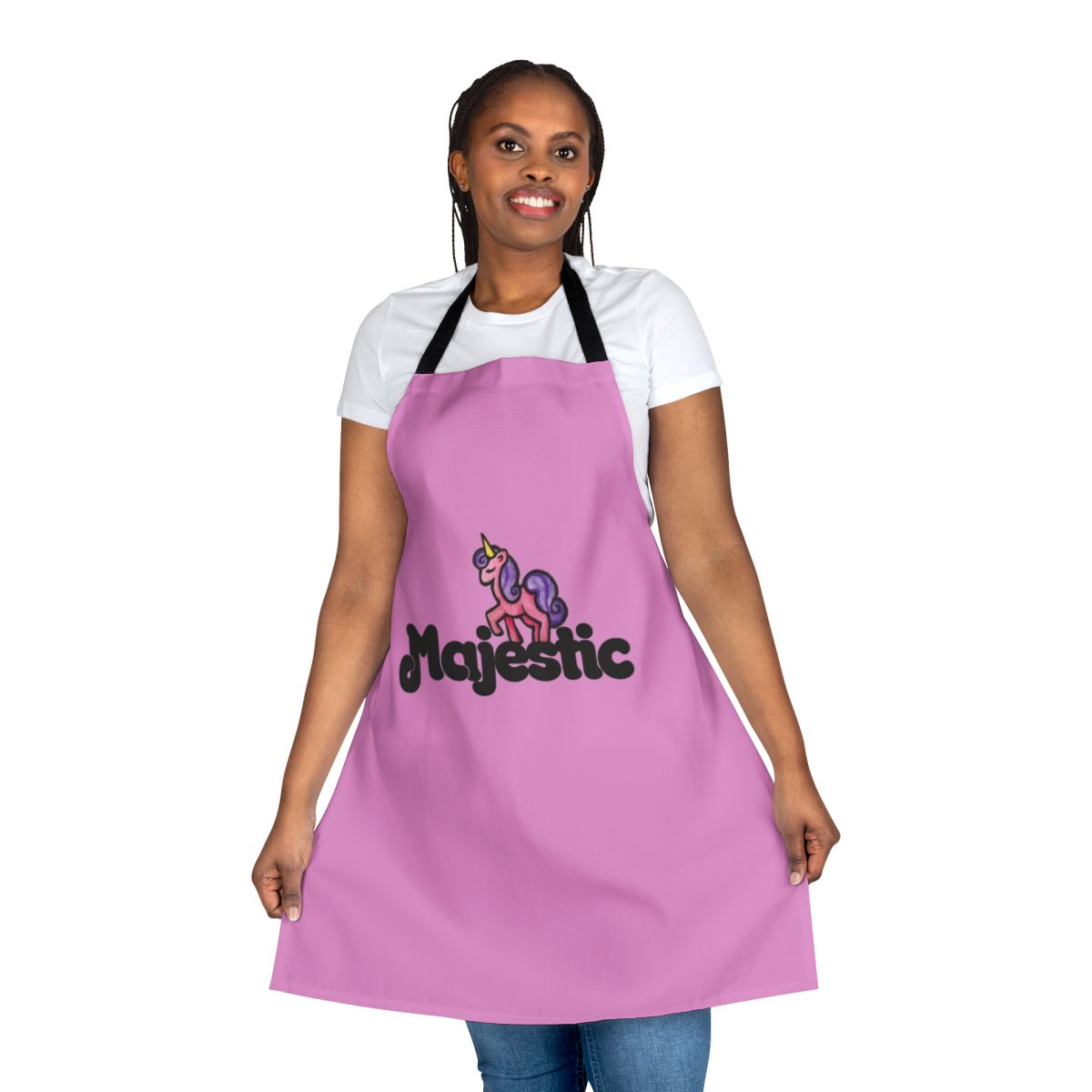 A pink and white apron with a magical unicorn design, perfect for the kitchen.