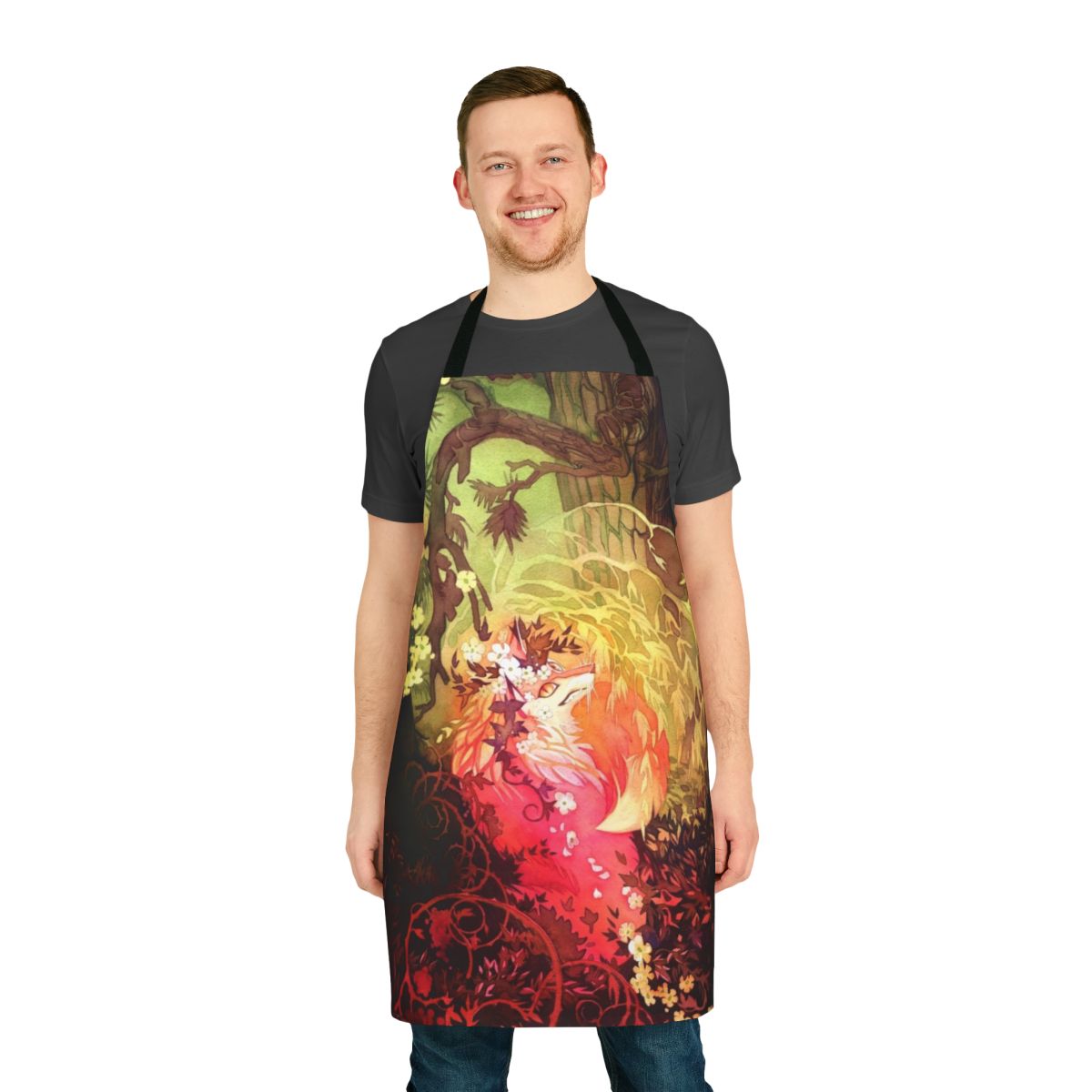 Illustration of a whimsical, watercolor fox surrounded by pink and magenta flowers, pine trees, and a floral border on a kitchen apron.