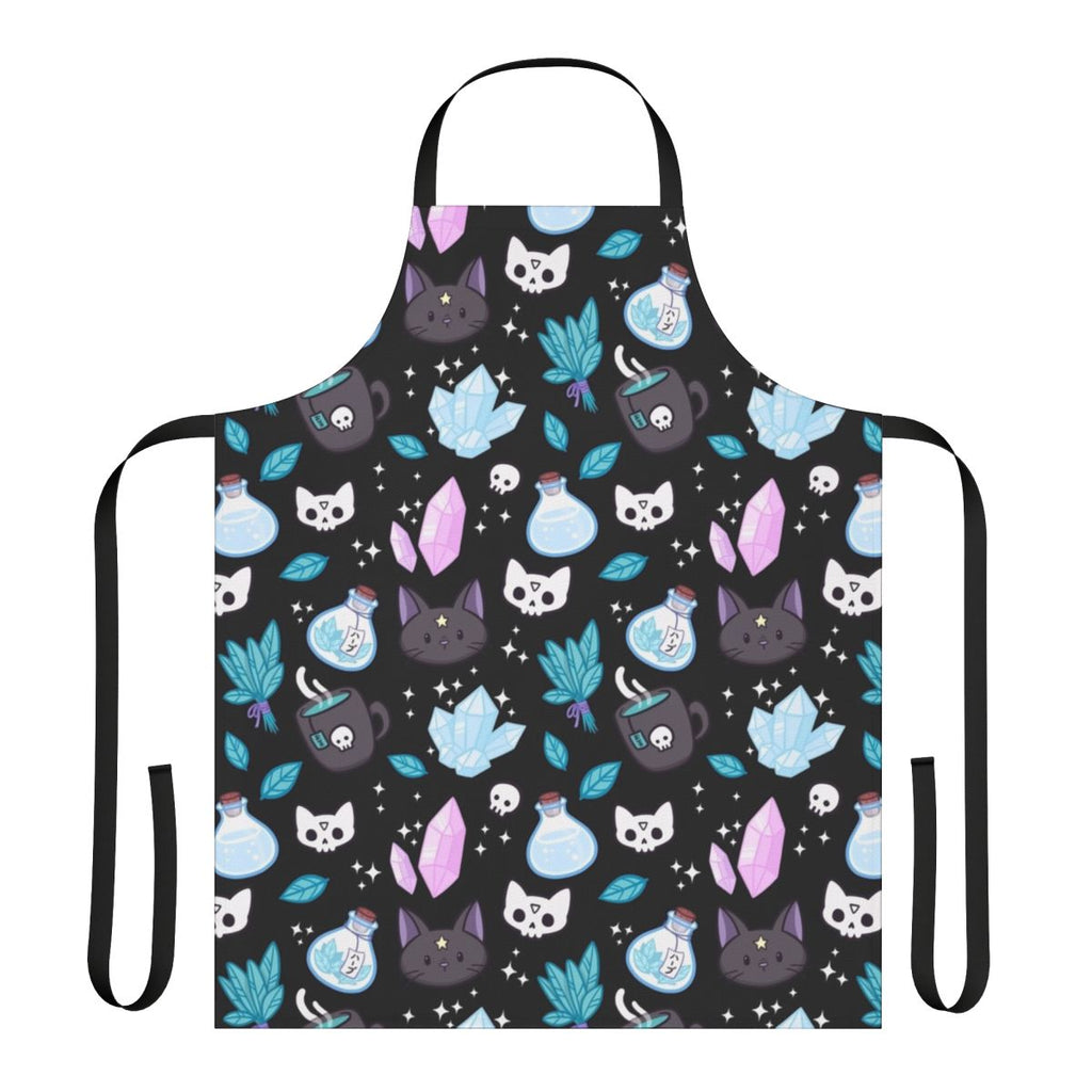 Stylish black apron featuring a whimsical cat skull and floral pattern, perfect for the modern witch or pagan