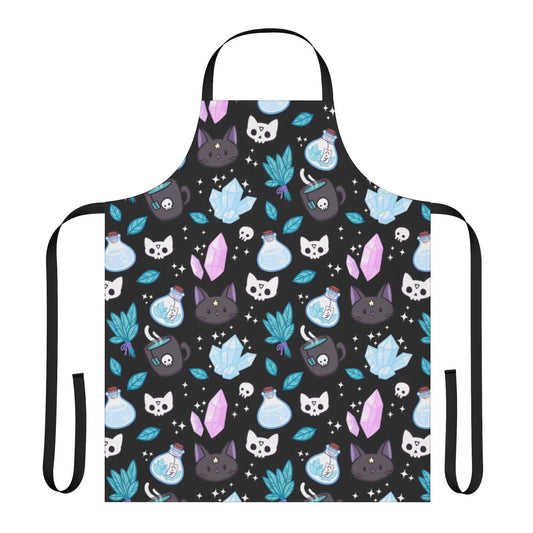 Stylish black apron featuring a whimsical cat skull and floral pattern, perfect for the modern witch or pagan