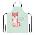 Shiba Inu dog breed wearing an apron with a positive message