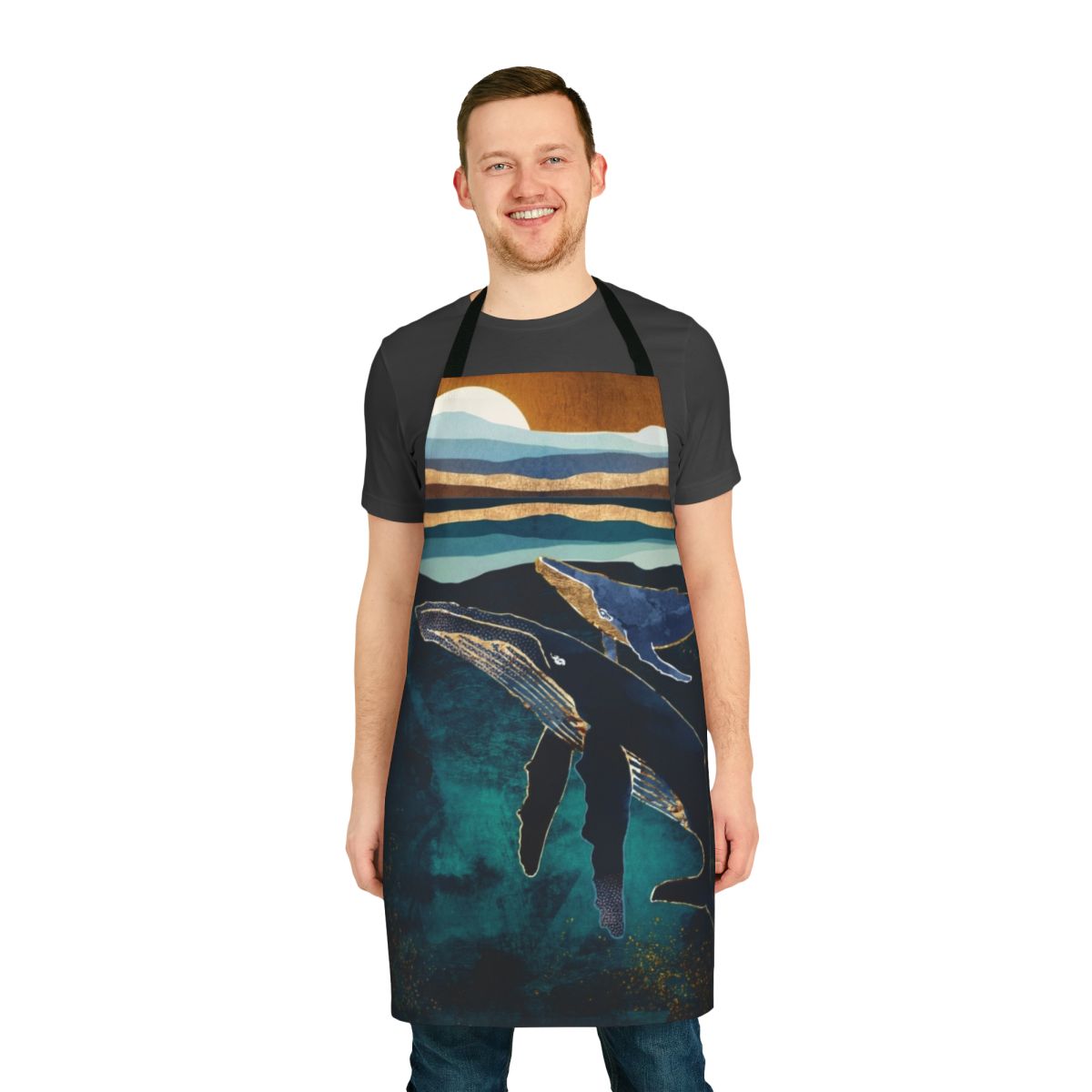 A vibrant, abstract apron featuring whales swimming in a moonlit ocean landscape.