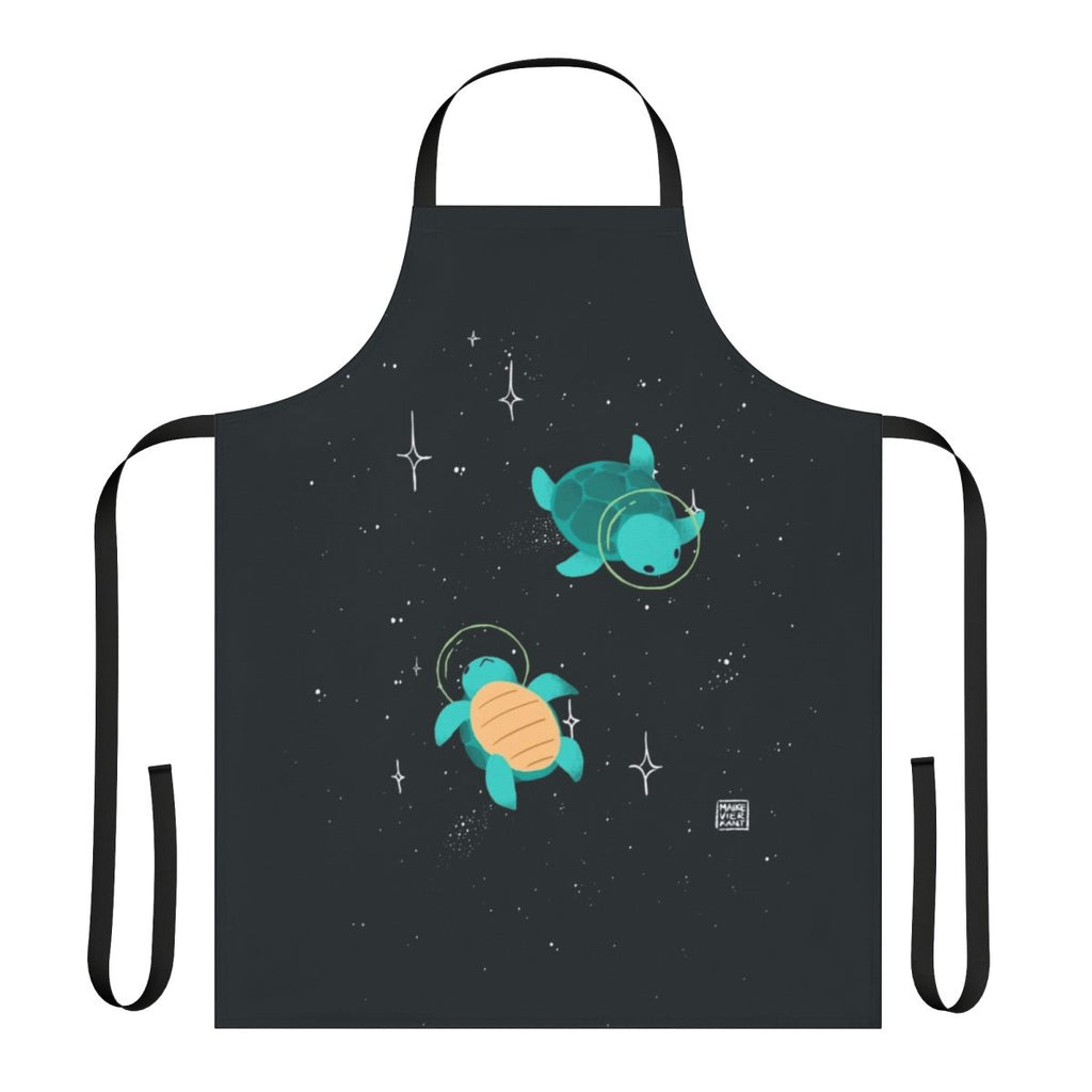 Apron featuring a design of a cute, green space turtle exploring the galaxy with stars and planets in the background.