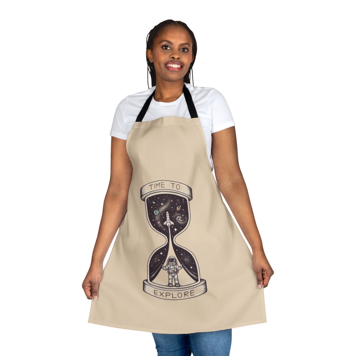 Person wearing an apron with a space-themed design, featuring planets, stars, and a shuttlecraft.