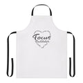 Facilitator wearing a navy blue apron with "Focus Group Facilitator" text
