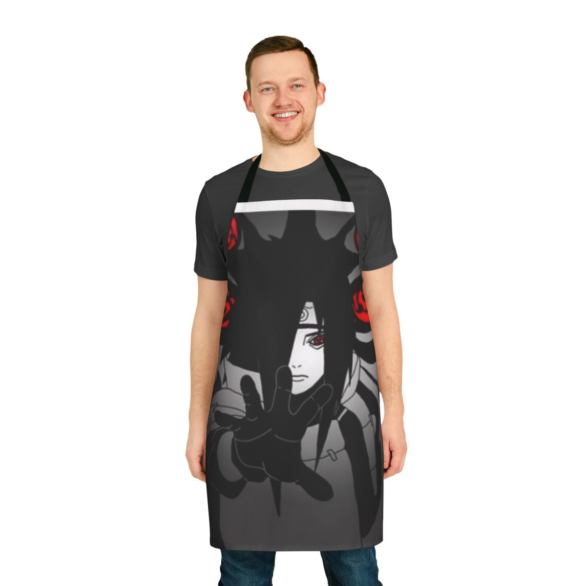 A black apron with the words "Fear M U" printed on it, perfect for horror fans in the kitchen.