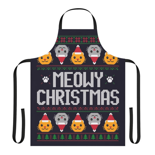 A yellow and green cat-themed apron with an ugly Christmas sweater print, featuring holiday elements like gingerbread men, Santa hats, and snowflakes.