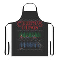 A colorful and cozy Christmas apron with a festive holiday sweater design