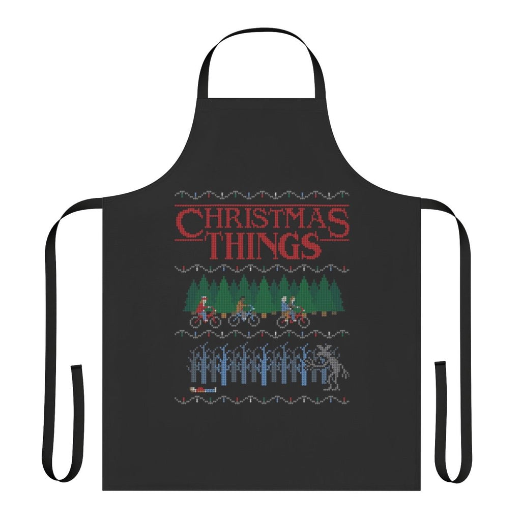 A festive Christmas-themed apron with a Stranger Things inspired design.