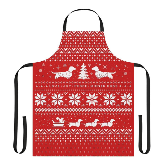 Dachshund wearing a Christmas sweater pattern on an apron