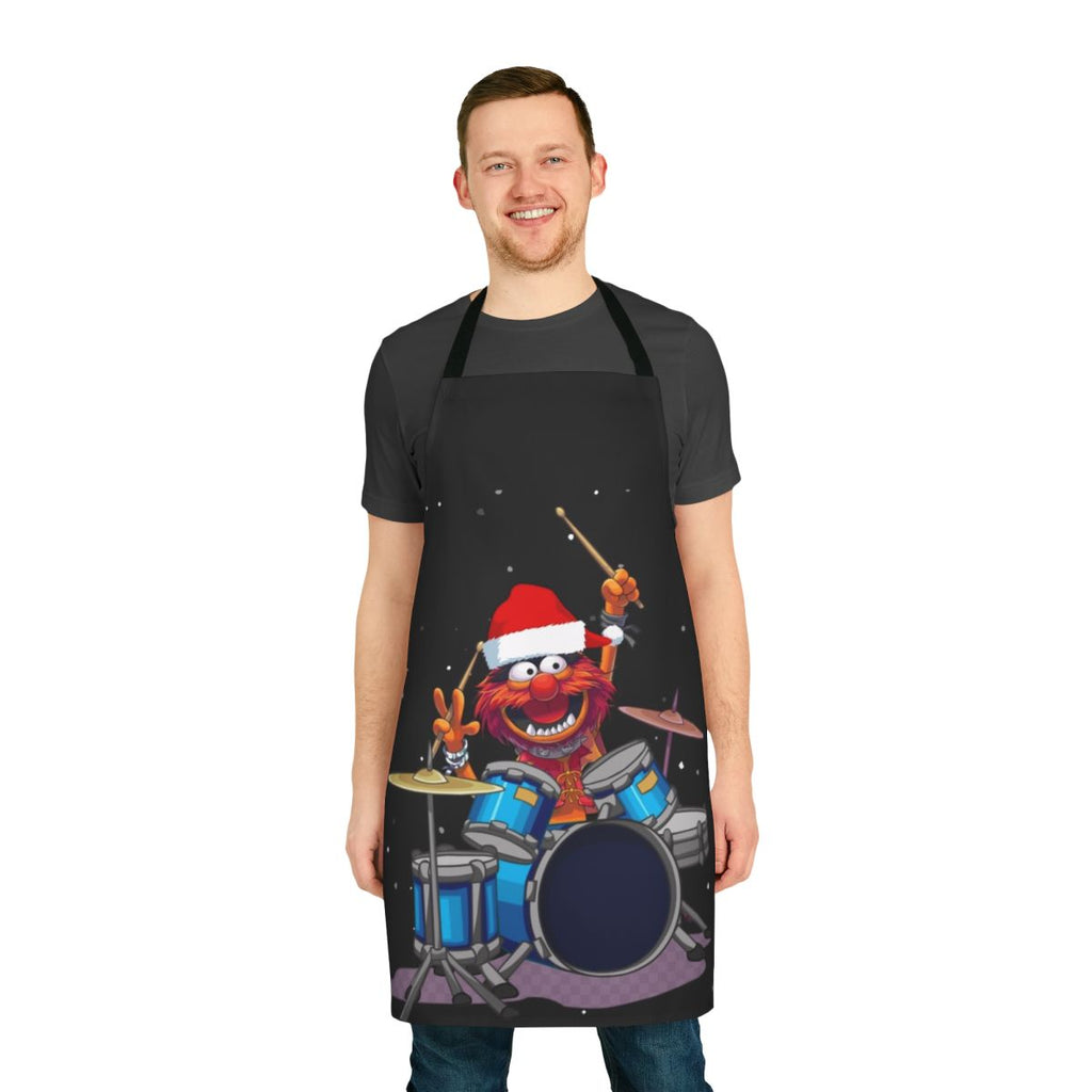 A whimsical apron featuring a Muppet-inspired animal drummer design, perfect for the holiday season.