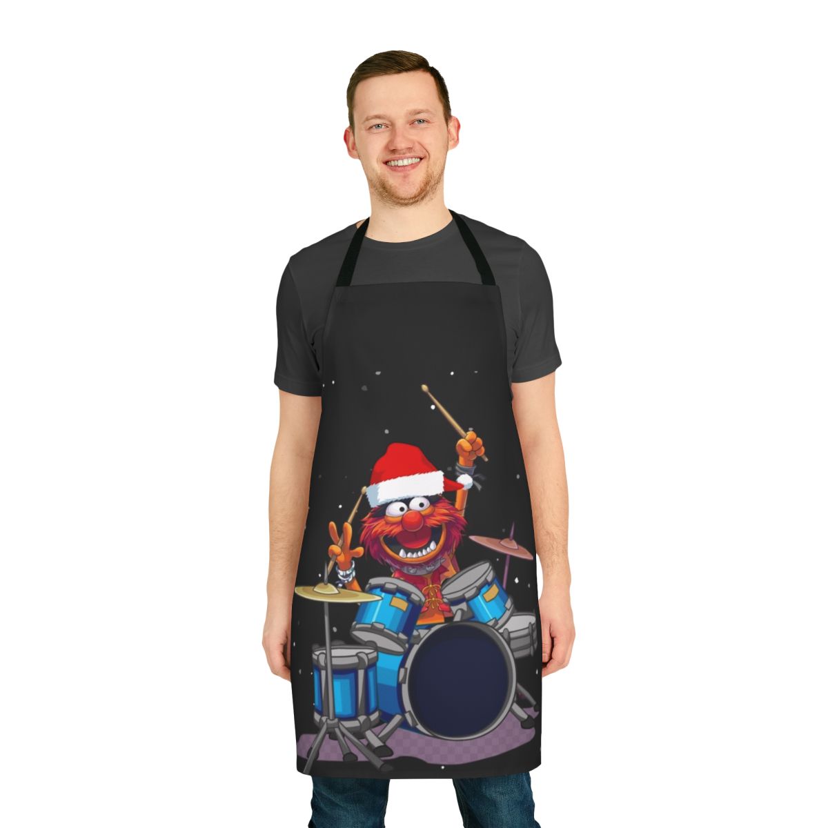 A whimsical apron featuring a Muppet-inspired animal drummer design, perfect for the holiday season.