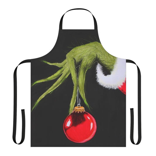 A green and red apron featuring a cartoon Grinch character, perfect for the holiday season