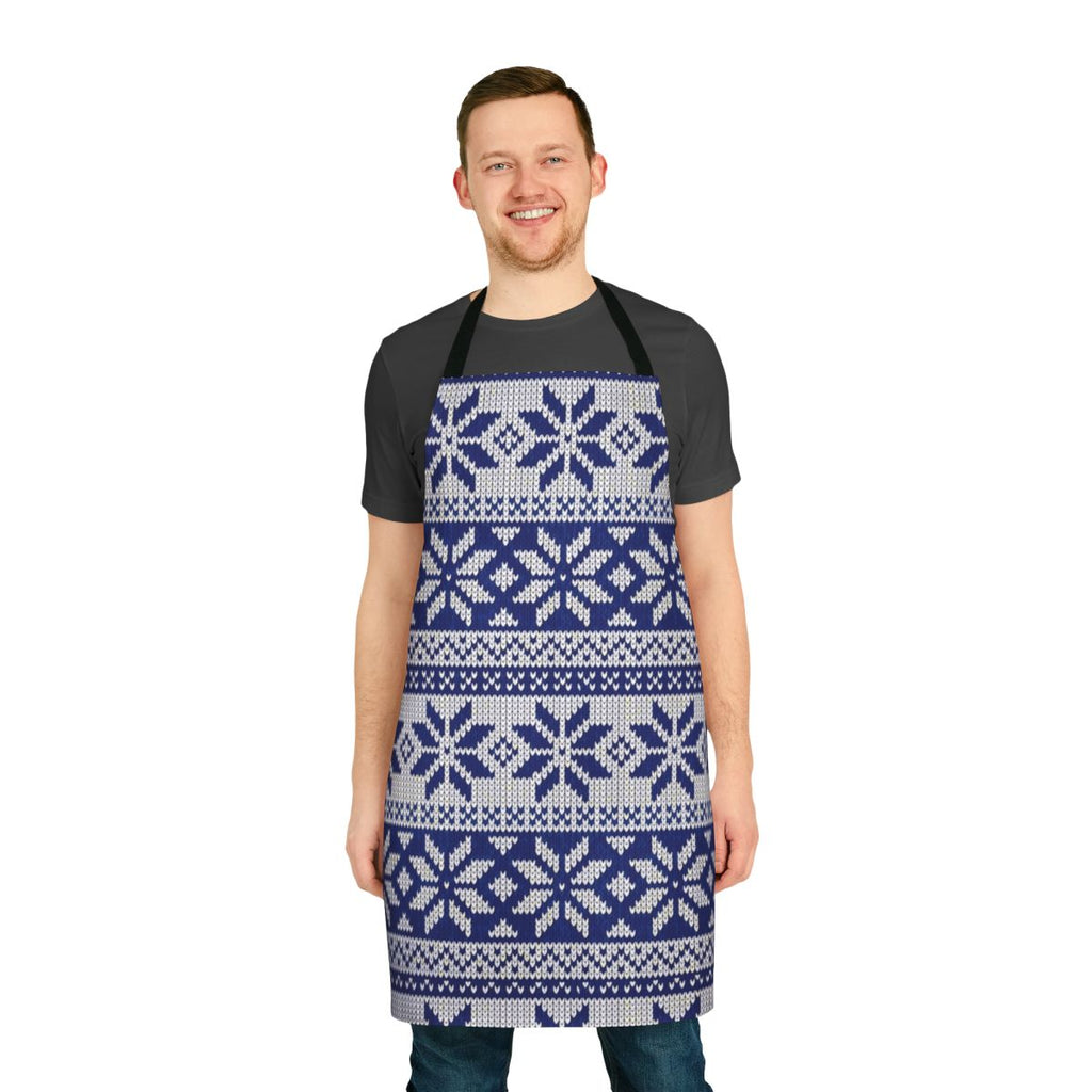 A cozy, knit Christmas apron featuring a festive sweater pattern design.