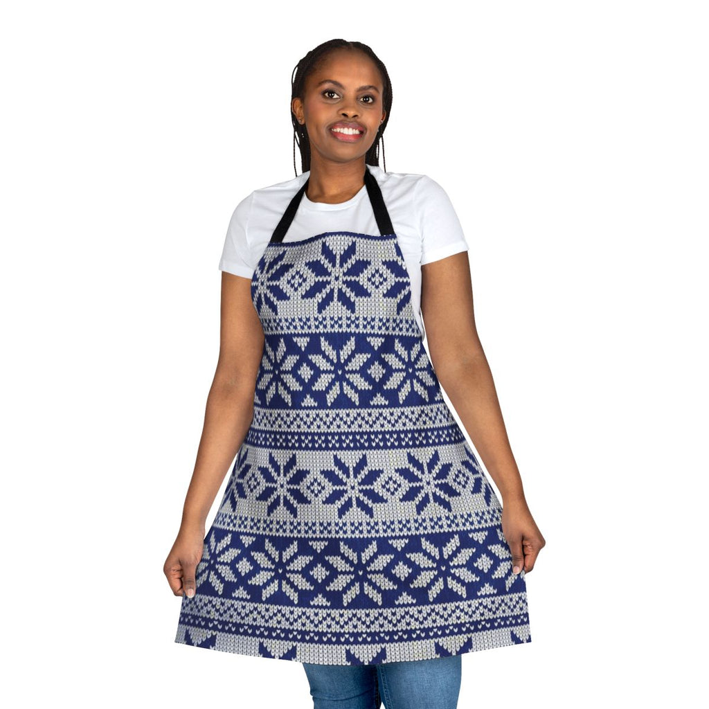A cozy, knit Christmas apron featuring a festive sweater pattern design.