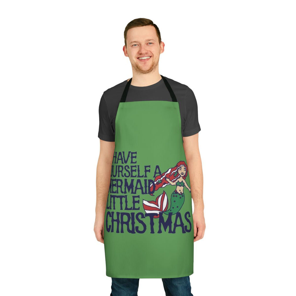 A whimsical holiday apron featuring a mermaid design, perfect for Christmas baking and cooking.