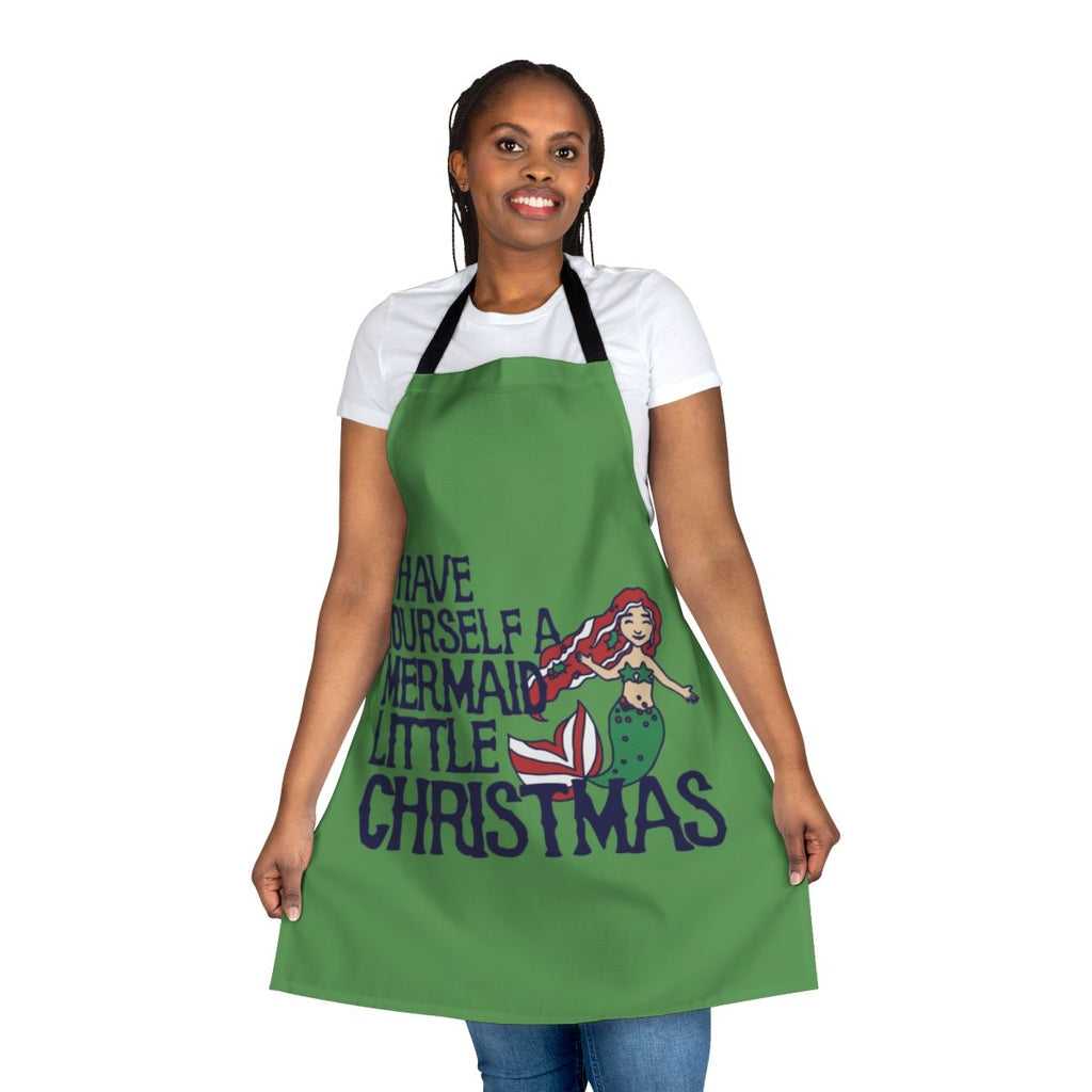 A whimsical holiday apron featuring a mermaid design, perfect for Christmas baking and cooking.