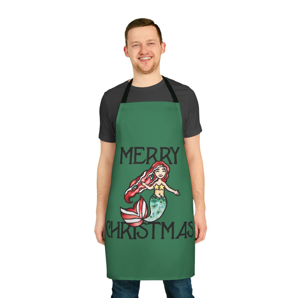 A cheerful mermaid-themed apron with a "Merry Christmas" design, perfect for holiday cooking and baking.