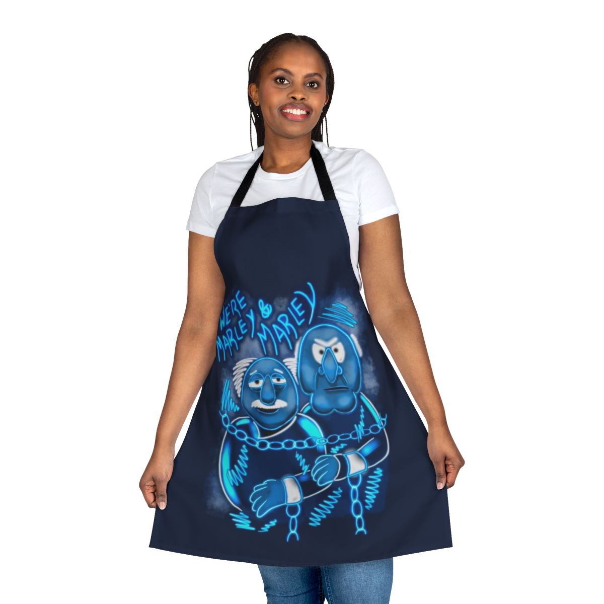 A festive apron featuring characters and imagery from the beloved Muppet Christmas Carol film.