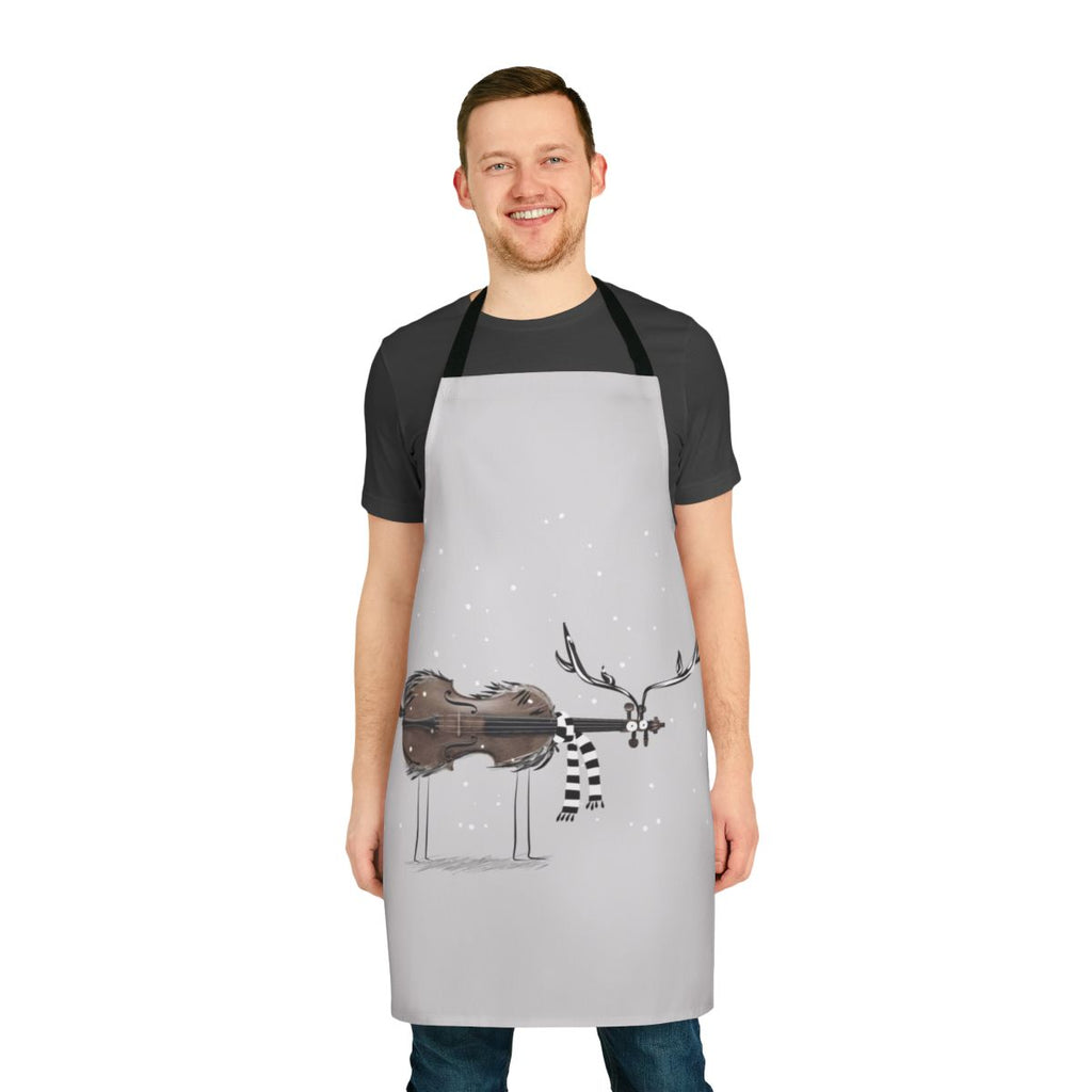 Christmas-themed apron featuring a reindeer playing a violin against a snowy backdrop