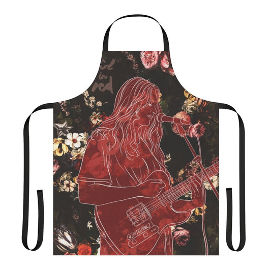 A red and rose patterned apron inspired by the music of the artist "Girl in Red"