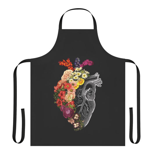 Vintage style floral apron with an anatomical heart design in black and white.