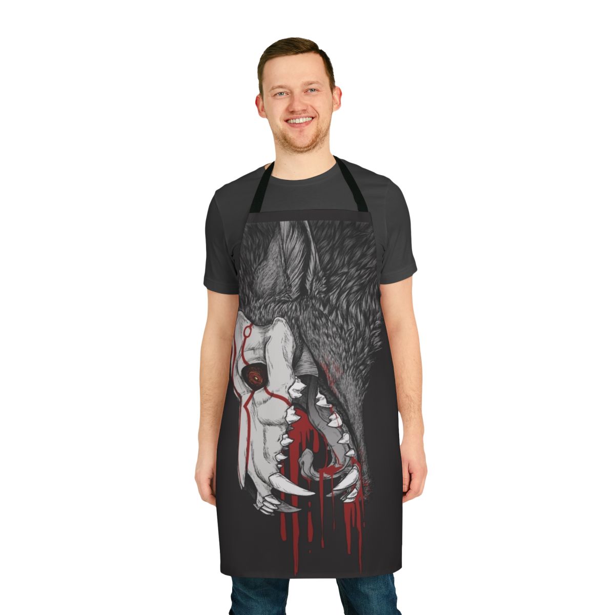 A black apron with a frightening horror-inspired design featuring wolves, teeth, and blood.