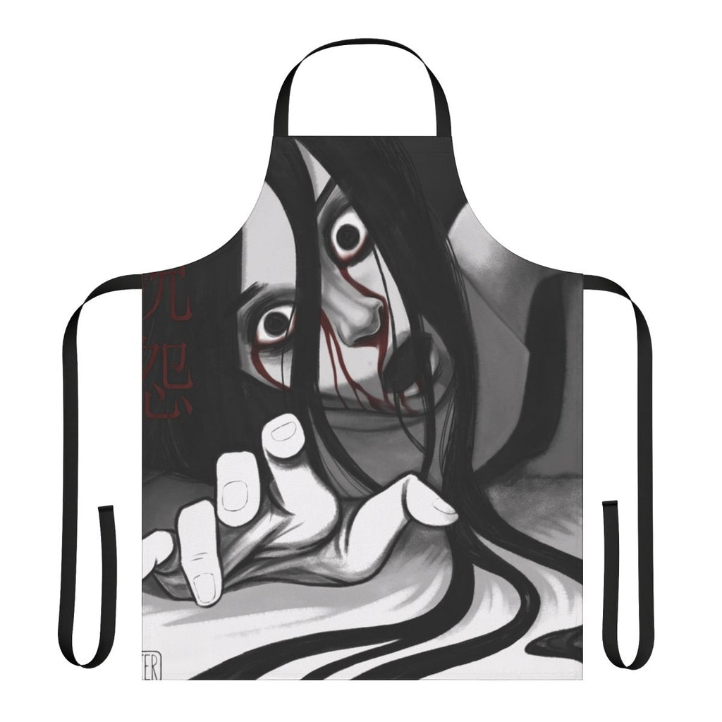 Illustration of Kayako Saeki, the terrifying ghost from the "Ju-On" horror franchise, featured on a black and white apron