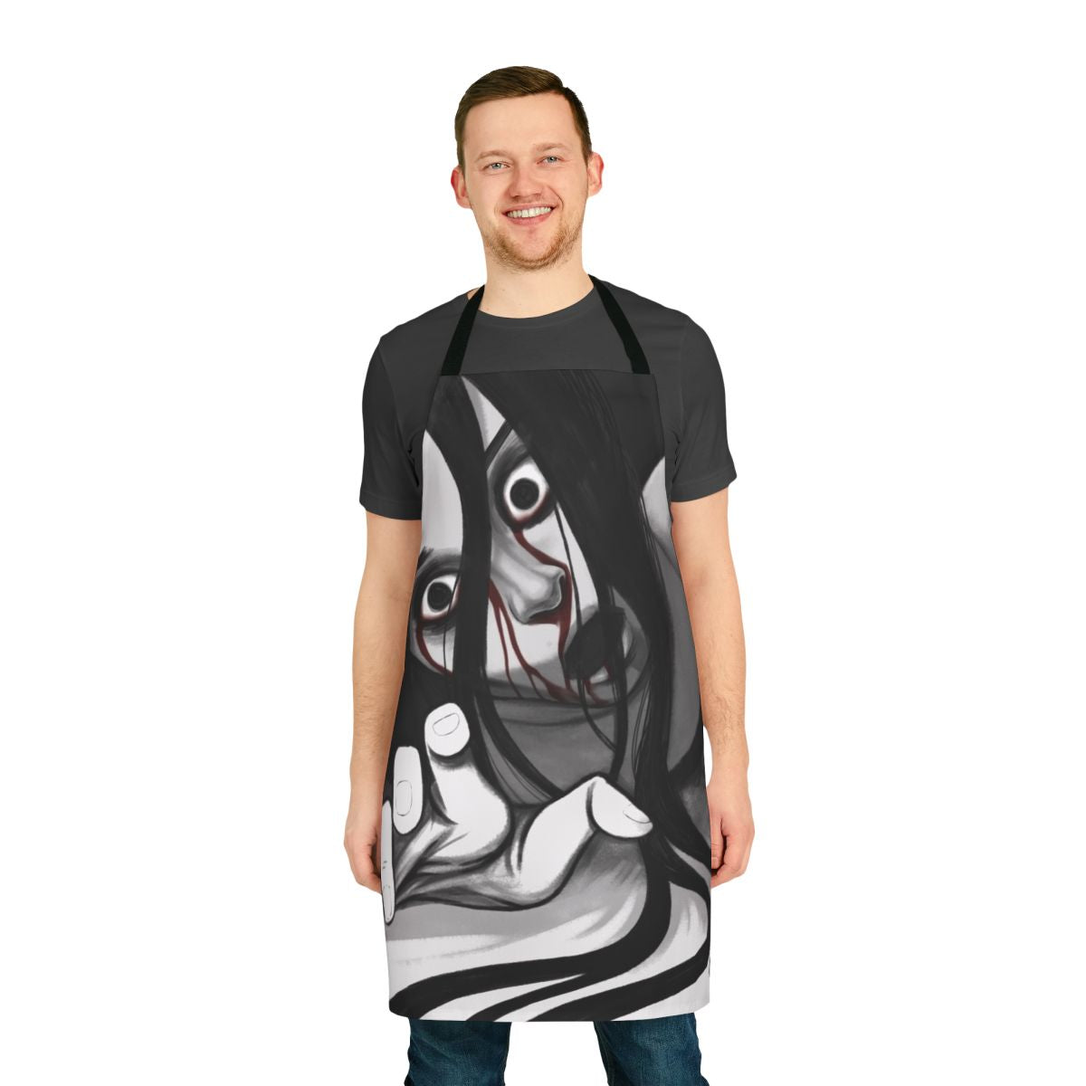 Illustration of Kayako Saeki, the terrifying ghost from the "Ju-On" horror franchise, featured on a black and white apron