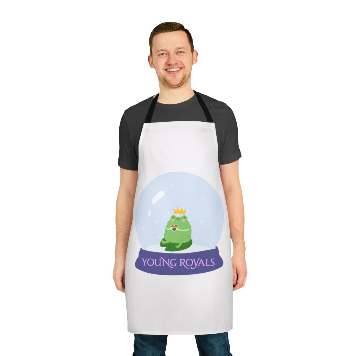 A snow globe-themed apron featuring the characters Wilhelm and Simon from the Swedish drama series Young Royals.